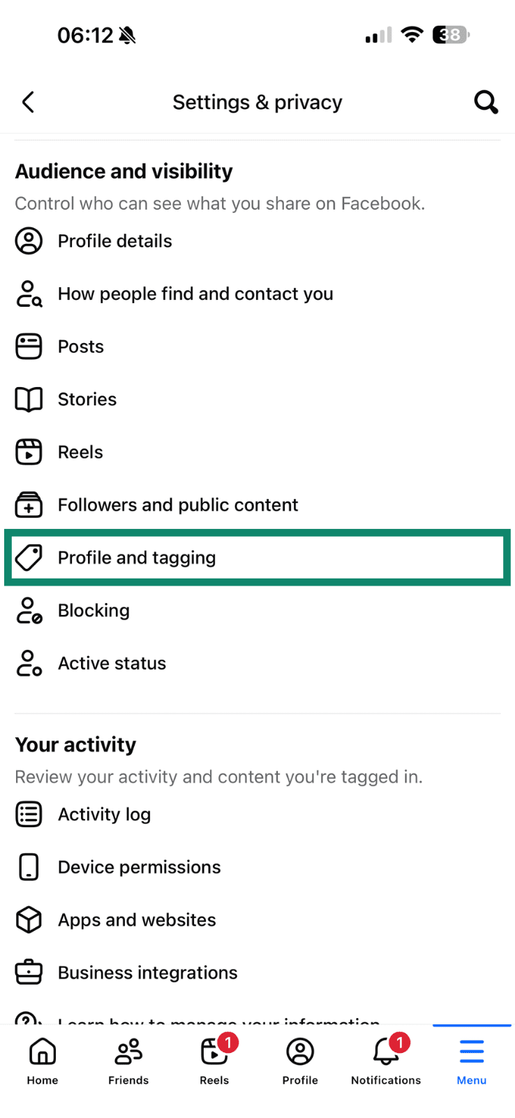 The Profile and Tagging menu item highlighted in Facebook's mobile settings menu.