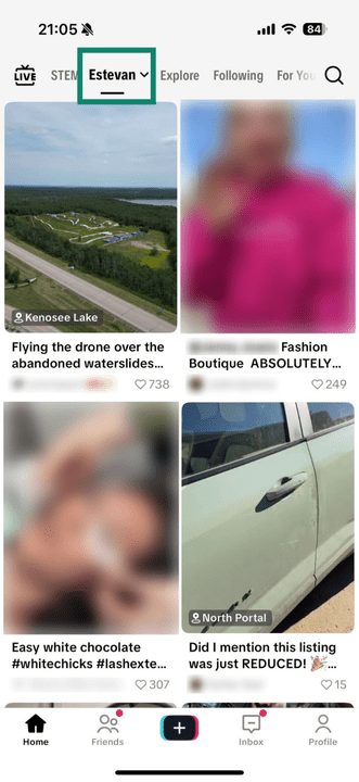 Screenshot of TikTok's mobile app showing the Nearby feed