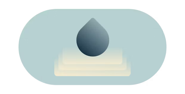 Vattendropp som skapar krusningar.