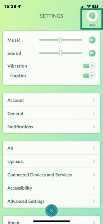Pokémon GO app open to Settings menu with Help icon highlighted